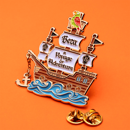 National Beta Club pins featuring the theme "A Voyage of Adventure"