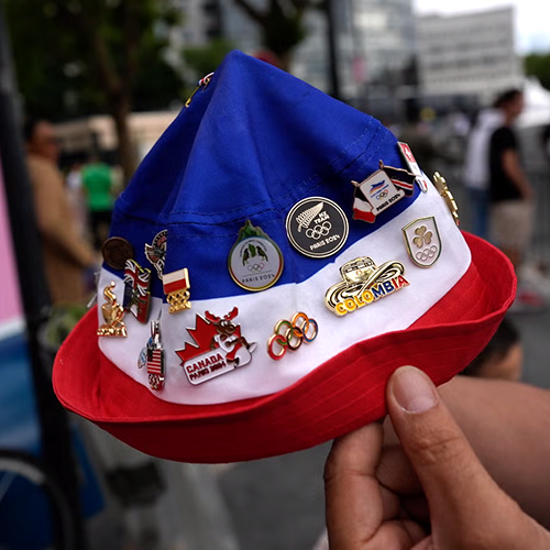 A custom trading pin collection from the 2024 Olympics