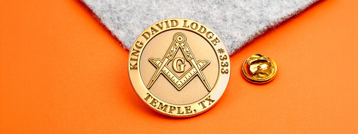 Gold round King David Lodge 333 pin with the square and compasses and Temple, TX, beside a gold clutch
